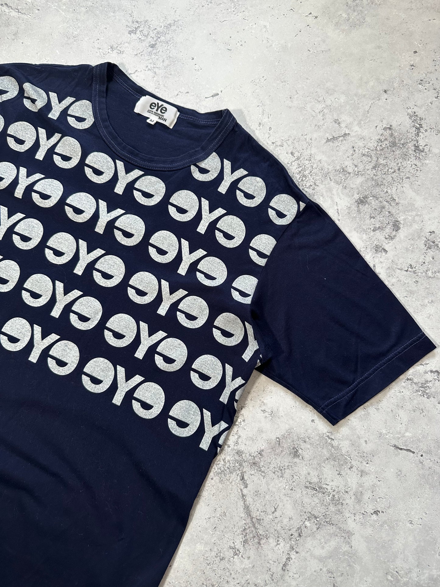 eYe Junya Watanabe MAN COMME des GARÇONS AD2012 All-Over Logo Print T-Shirt