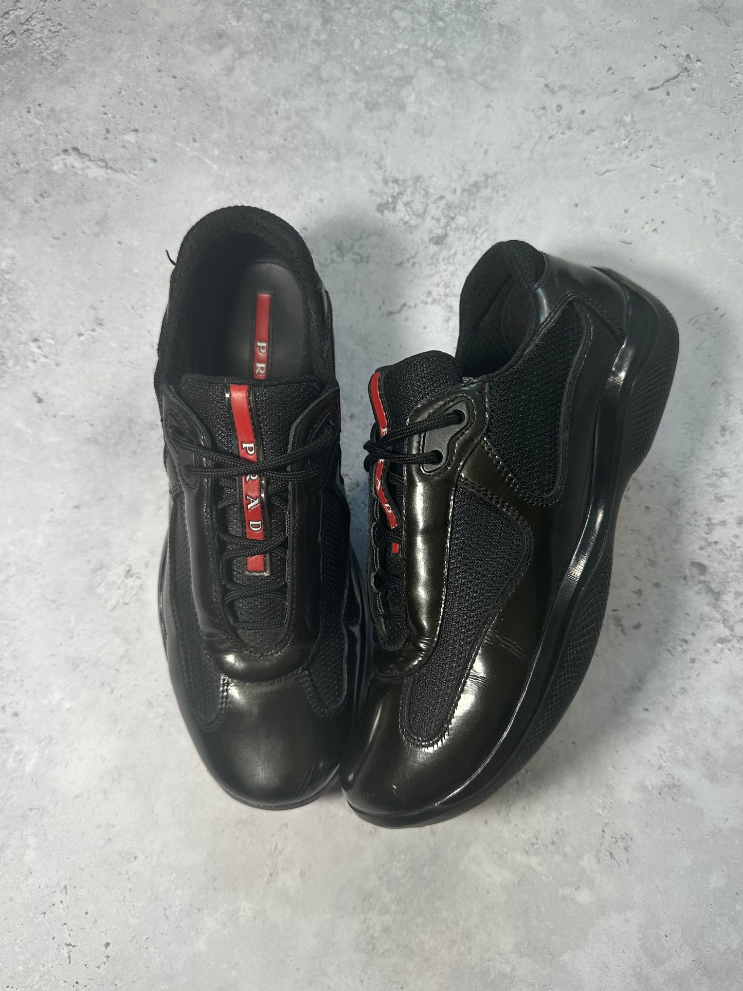 Prada Linea Rossa America’s Cup Patent Sneakers in Black / Deep Green