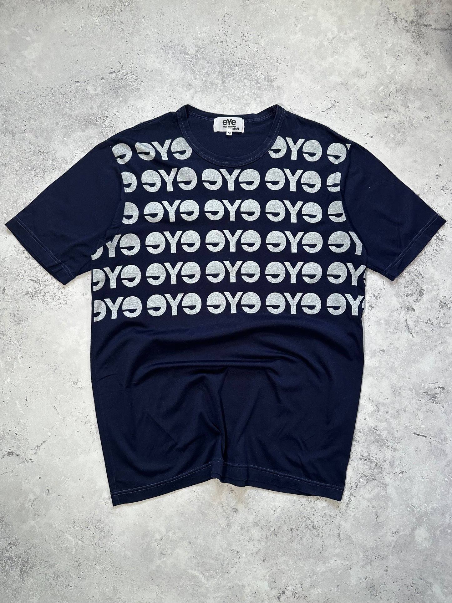 eYe Junya Watanabe MAN COMME des GARÇONS AD2012 All-Over Logo Print T-Shirt