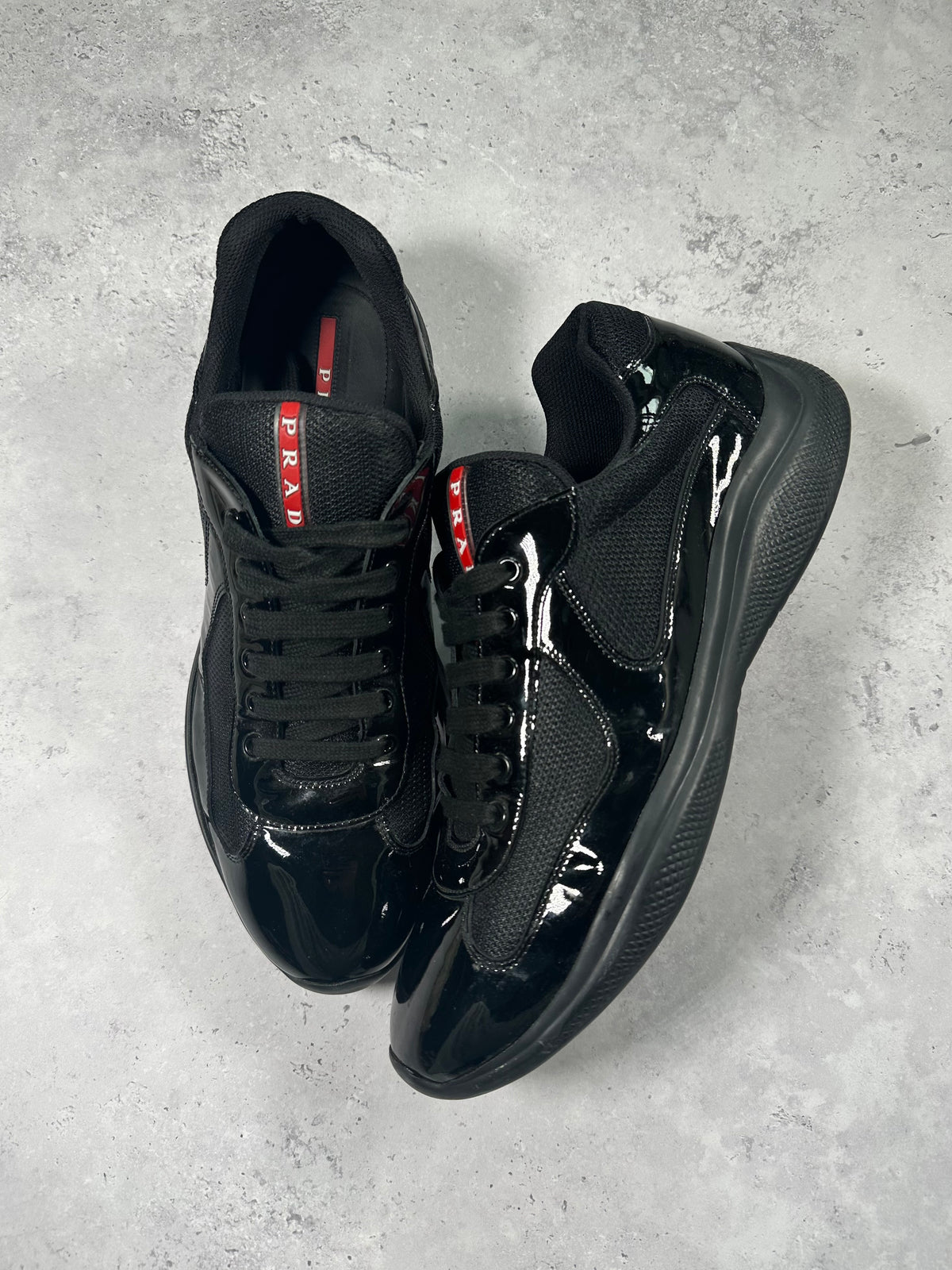 Prada America’s Cup 2022 Patent Leather Sneakers in Black (UK11/US12/EU45)