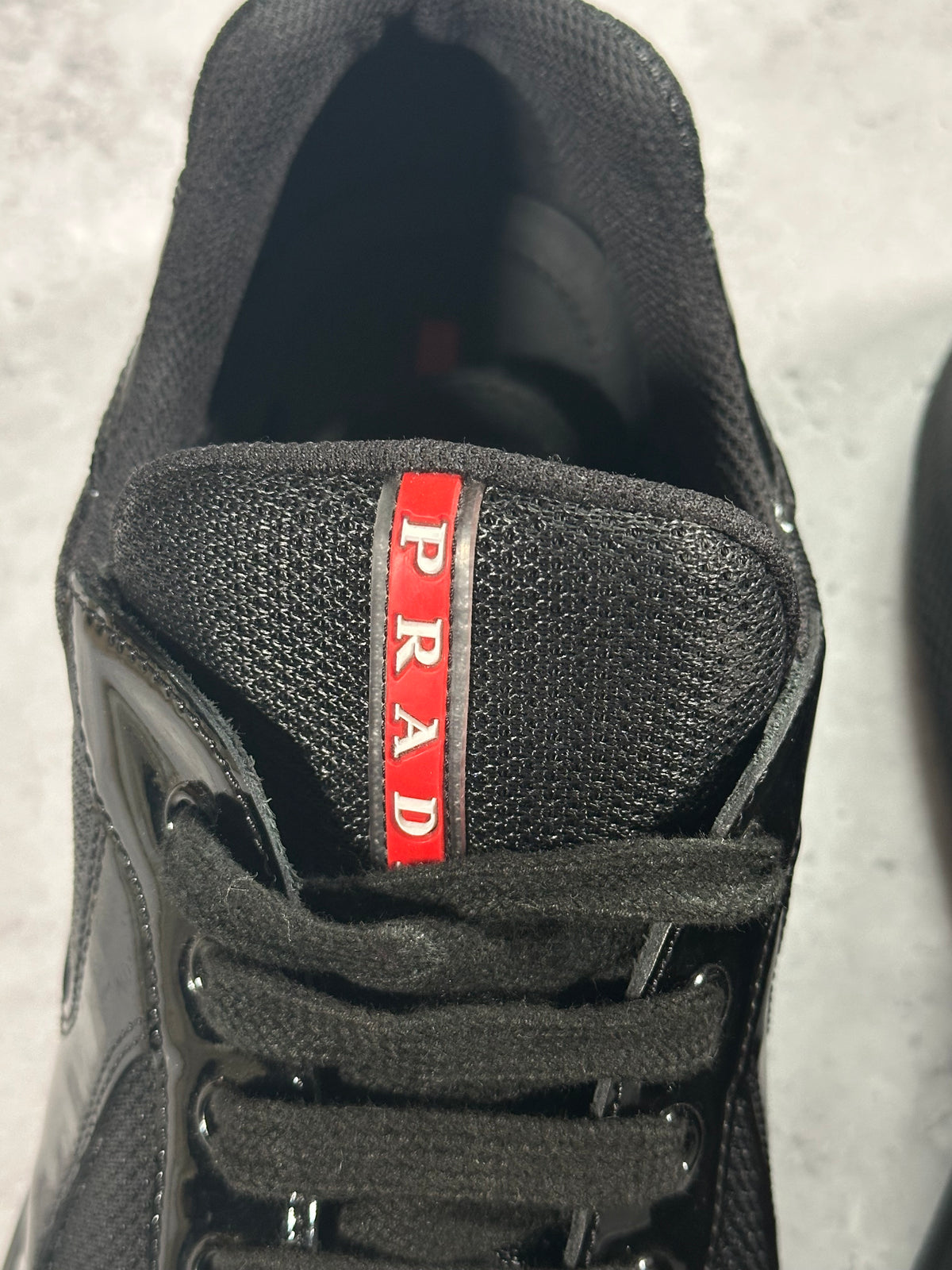 Prada America’s Cup 2022 Patent Leather Sneakers in Black (UK11/US12/EU45)