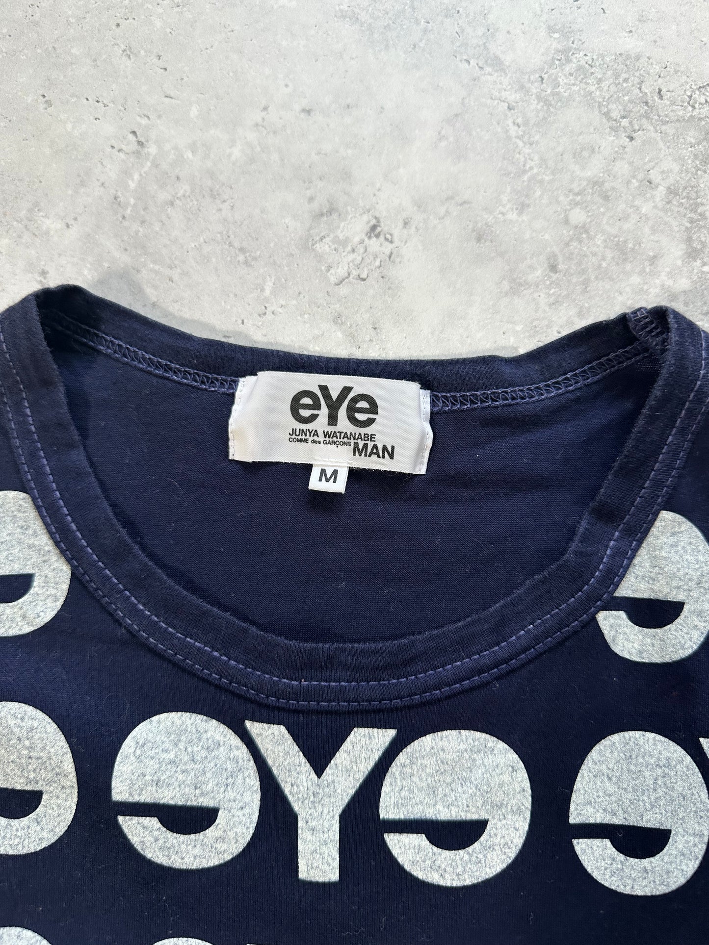 eYe Junya Watanabe MAN COMME des GARÇONS AD2012 All-Over Logo Print T-Shirt