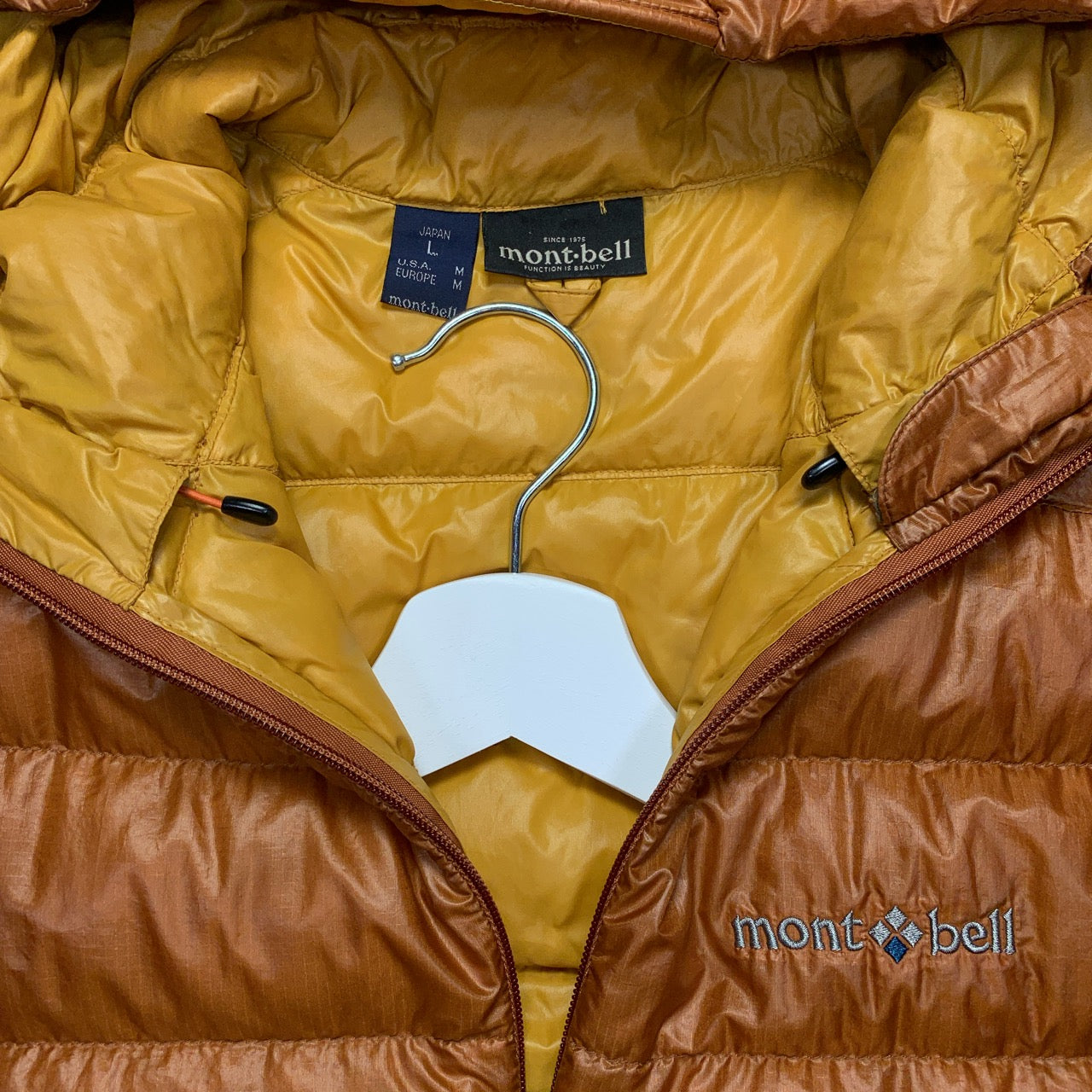 Montbell Hooded Puffer Jacket in Bronze/Yellow