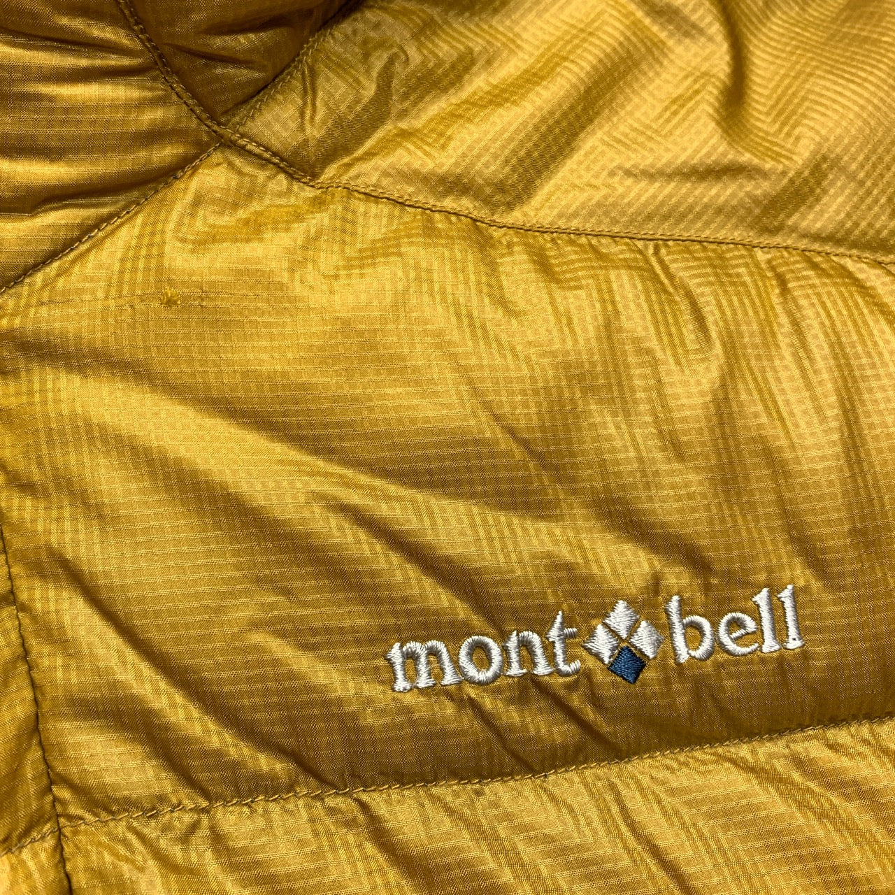 Montbell Hooded Puffer Jacket in Yellow