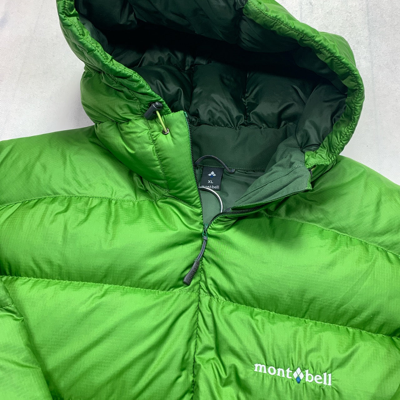 Montbell Hooded Puffer Jacket in Green